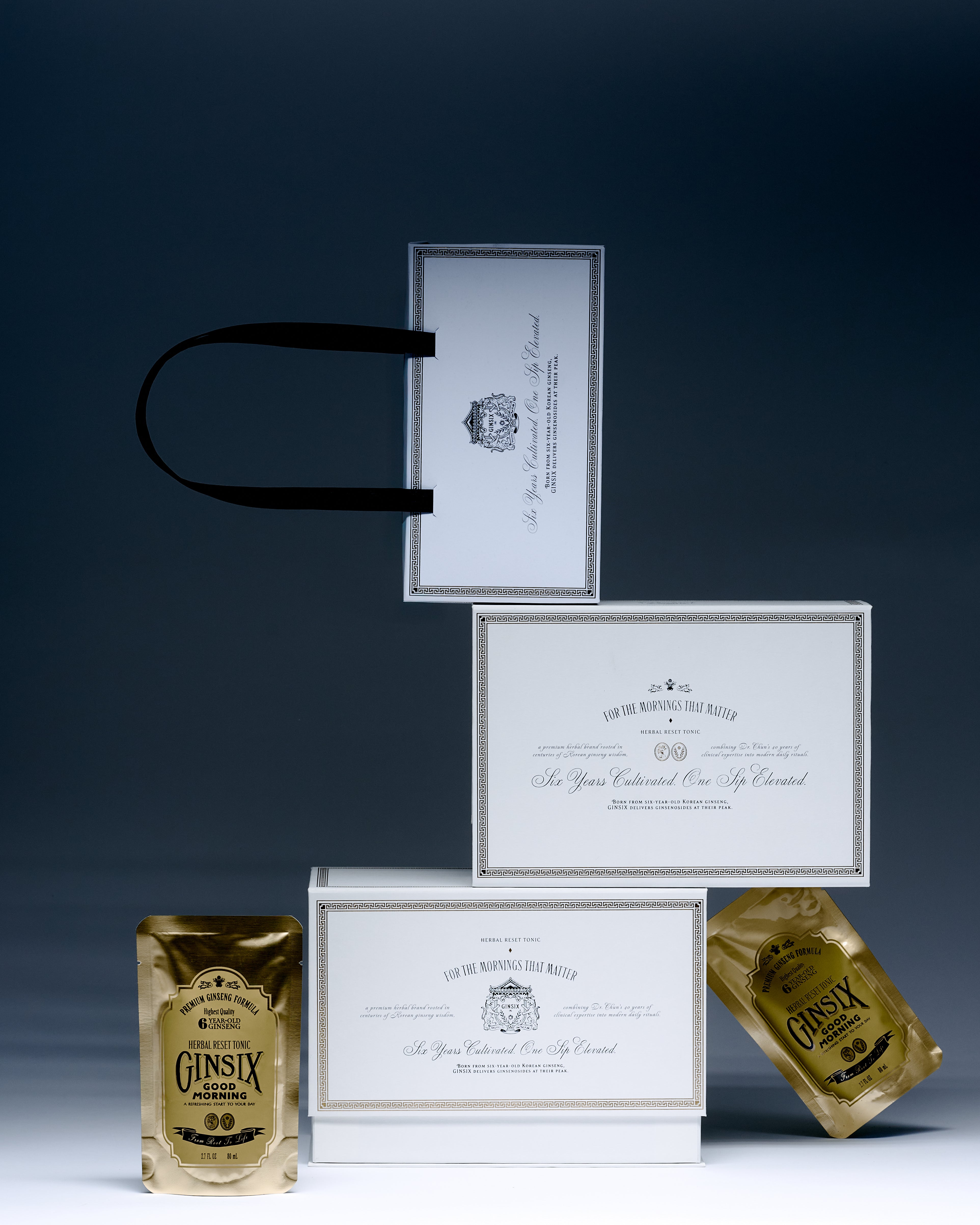 GINSIX Morning Ritual gift box set with gold herbal tonic pouches and carry box
